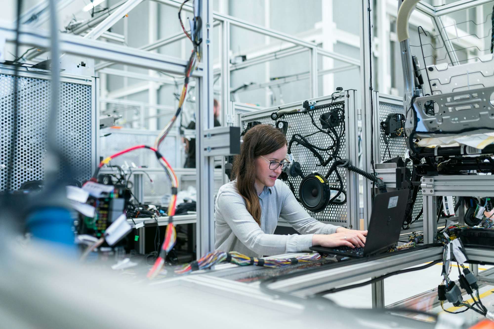 Technician at an electronics manufacturing station